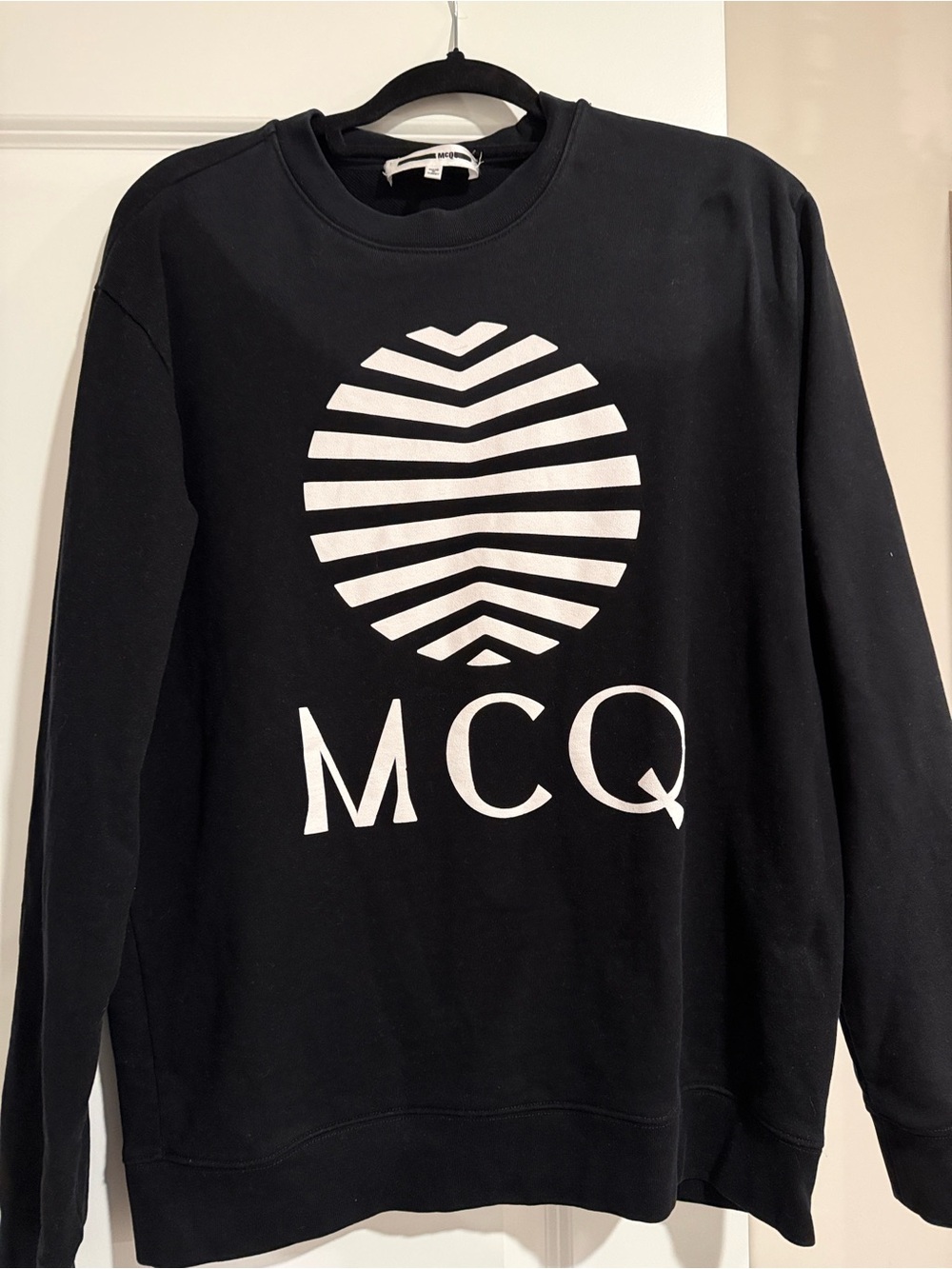 McQ by Alexander McQueen Black Crewneck Sweatshirt with White Care Tag Detail